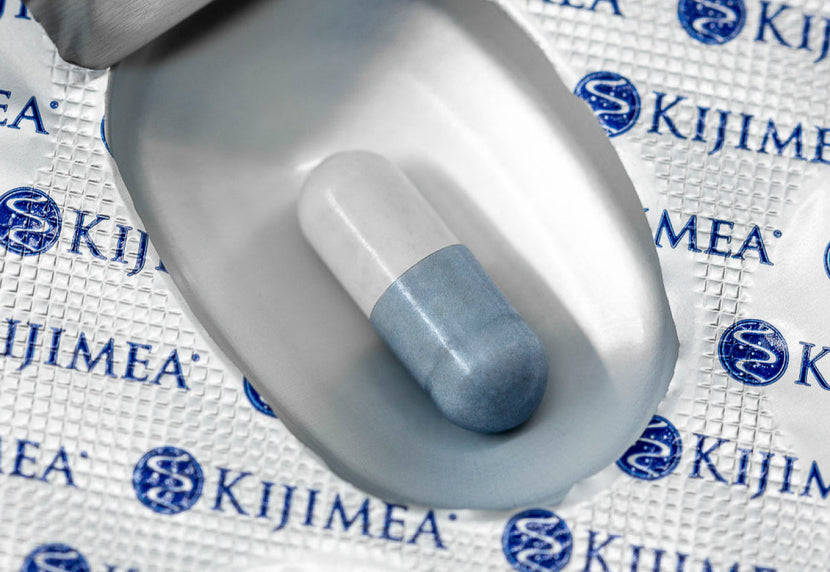 
Een Kjimea-capsule in zijn verpakking
